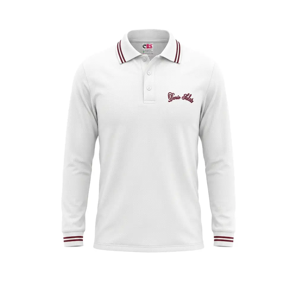 Polera piqué escolar de color blanco manga larga con el bordado oficial del Colegio Darío Salas de Puerto Montt.